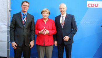 v.l.n.r.: Stephan Santelmann, Angela Merkel und Hermann-Josef Tebroke