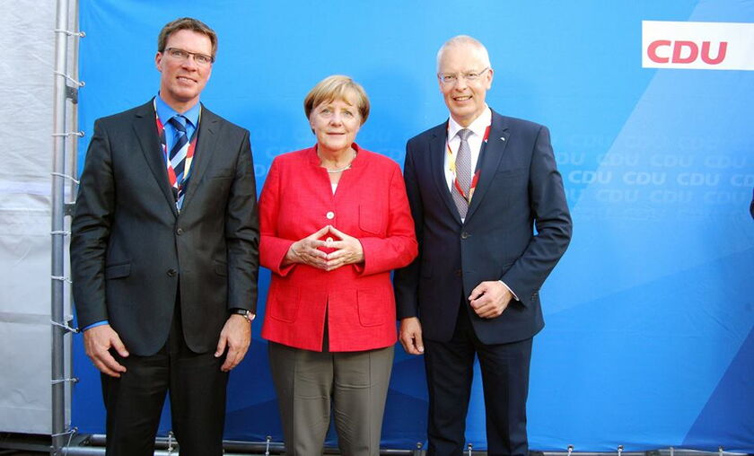 v.l.n.r.: Stephan Santelmann, Angela Merkel und Hermann-Josef Tebroke